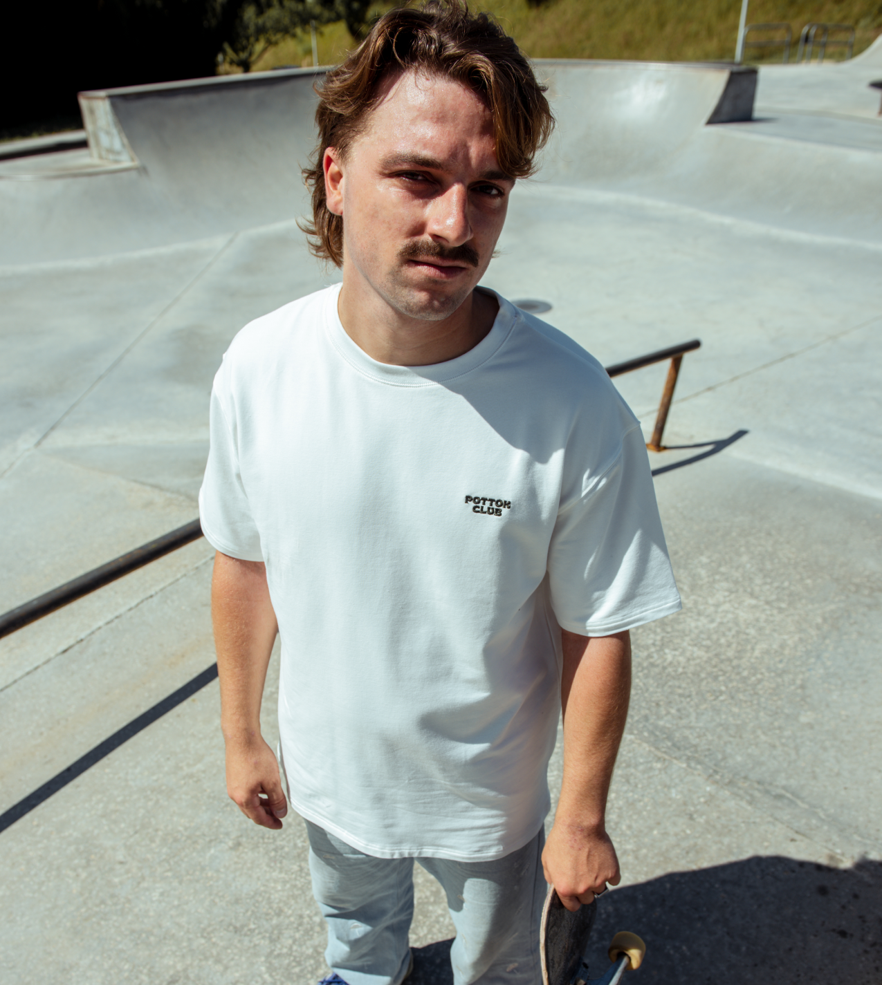 t-shirt oversize blanc j'élève des licornes au skatepark